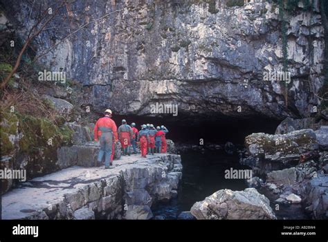 Potholers Entrance to Porth yr Ogof Caves Ystradfellte Brecon Beacons Mid Wales Stock Photo - Alamy