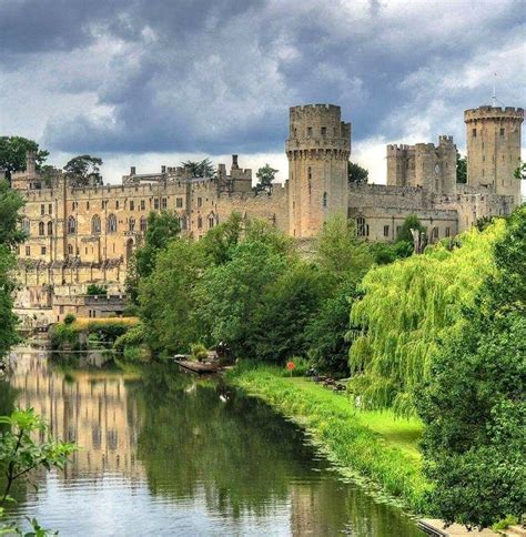 The Medieval Warwick Castle On The Banks Of The River Avon Warwick