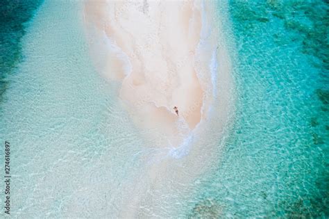 Naked Island View From The Sky Man Relaxing Taking Sunbath On The Beach Shot Taken With Drone