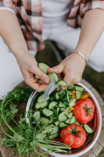 top view   person slicing vegetables   canva