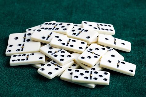 Premium Photo Falling Dominoes Domino Effect The Domino Game