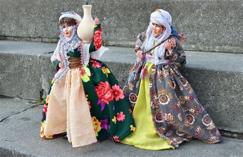 Doll in Kurdish national costume exposed in center of city in frame of ...