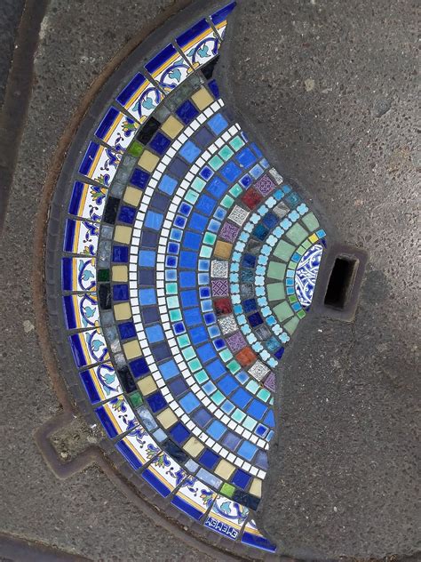 Street Artist Transforms Cracks in the Pavement Into Gorgeous Mosaics