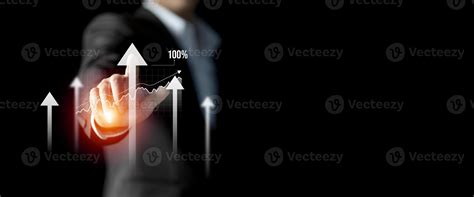 Businessman hand pointing graph to success, growing growth business