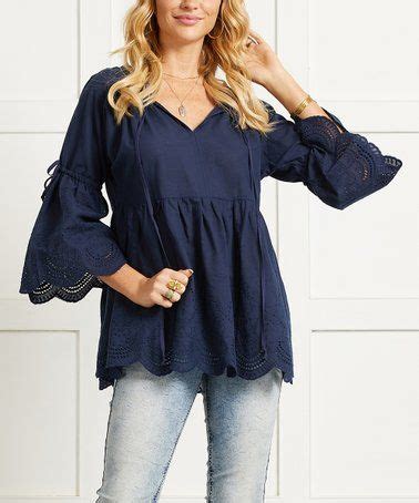 This Navy Eyelet Scallop Hem Notch Tie Neck Empire Waist Tunic Women