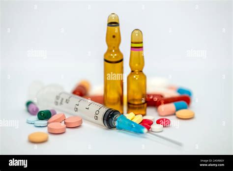 Pills And Injection Hi Res Stock Photography And Images Alamy