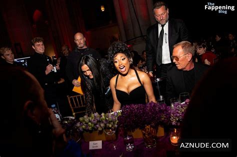 Megan Thee Stallion Sexy Flaunts Her Hot Cleavage And Legs In A Stunning Black Dress At Golden