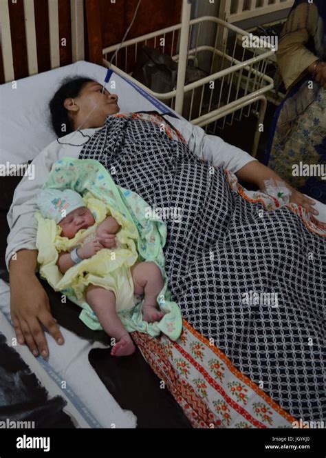 Pakistani Mothers With Their New Born Infants At Local Hospital On The