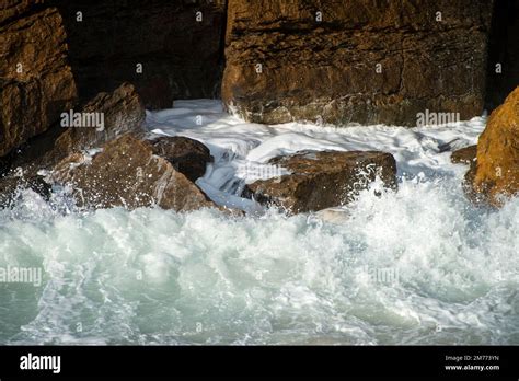 Ocean Waves Hitting Rocks Stock Photo Alamy