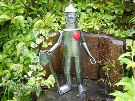 Gorgeous Tin Man Garden Ornament Who Has His Red Heart And A Huge Smile