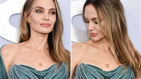 Angelina Jolie Debuts New Boldly Placed Tattoo In Low Cut Dress Ahead