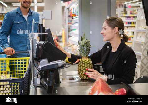 Man Buying Goods In A Grocery Store Stock Photo Alamy