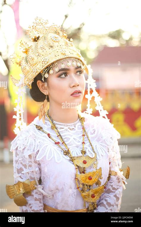 Beautiful portrait young asian woman wearing traditional Indonesian Lampung culture clothes ...