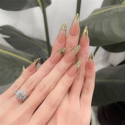 𝐍𝐚𝐢𝐥𝐬 𝐁𝐲 𝐉𝐞𝐧𝐧𝐲 on Instagram dipped in gold transparent nude on long gel x almond s