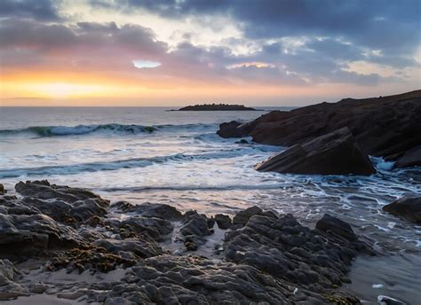 Premium Ai Image Sunset Over The Atlantic Ocean In Cornwall England