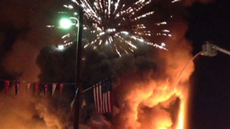 Fireworks explode over blaze - CNN Video