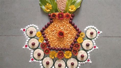 a decorative flower arrangement on the ground with leaves and flowers ...