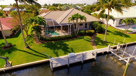 Waterfront Pool Home in Hobe Sound - Salefish Properties Real Estate