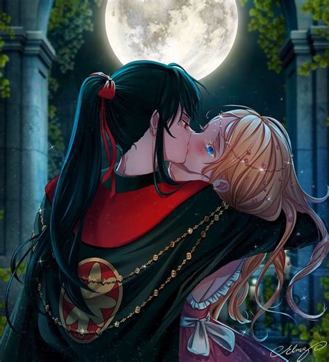 A Couple Kissing In Front Of A Full Moon