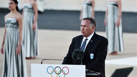 Olympic Flame Passed To Paris 2024 Delegation During Handover Ceremony