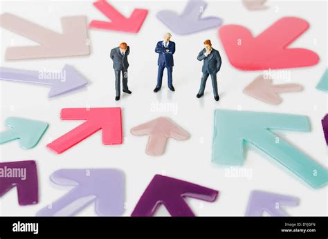 Business Figurines With Arrows Hi Res Stock Photography And Images Alamy