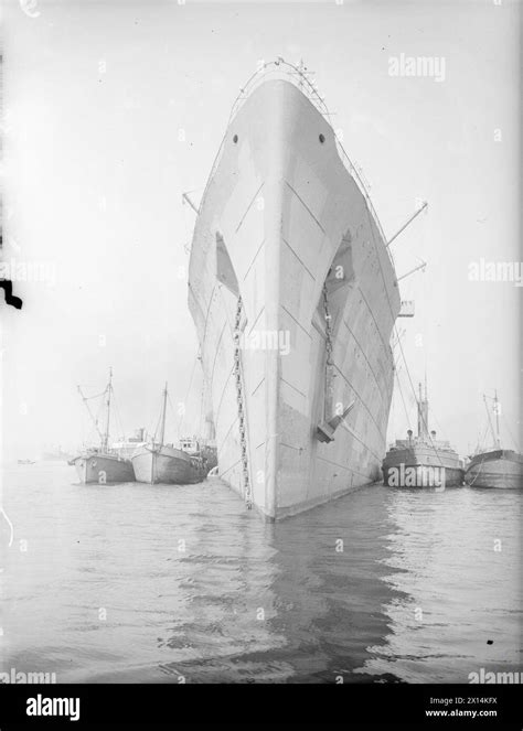 Former Luxury Liner Now Troopship Ss Queen Mary At A British Port 21