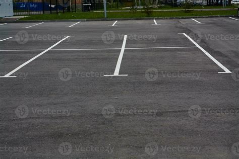 Photo of empty parking lot without cars. 26162527 Stock Photo at Vecteezy
