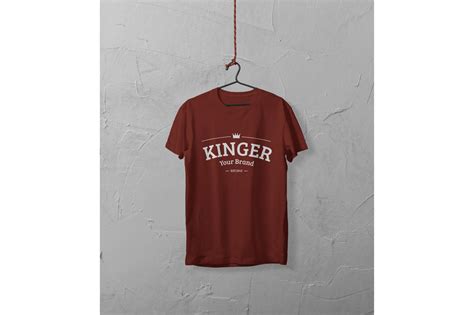 T Shirt Hanged By The Wall Mockup Graphic By Goldtreeartdesigns · Creative Fabrica