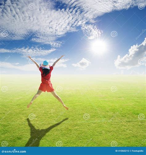 Happy Woman Jumping In Grass Fields And Blue Sky Stock Image Image Of