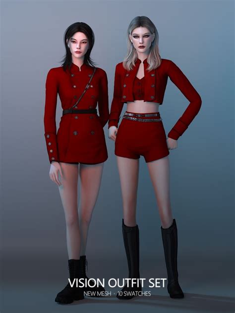 Two Women In Red Outfits Standing Next To Each Other With Their Hands