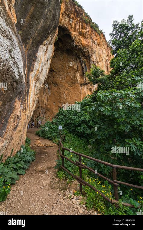 Tourists Visiting The Cave Grotta Dell Uzzo At Zingaro Nature Reserve