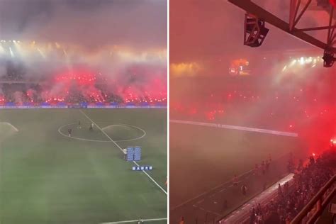 Watch incredible moment AEK Athens fans set off hundreds of flares ...