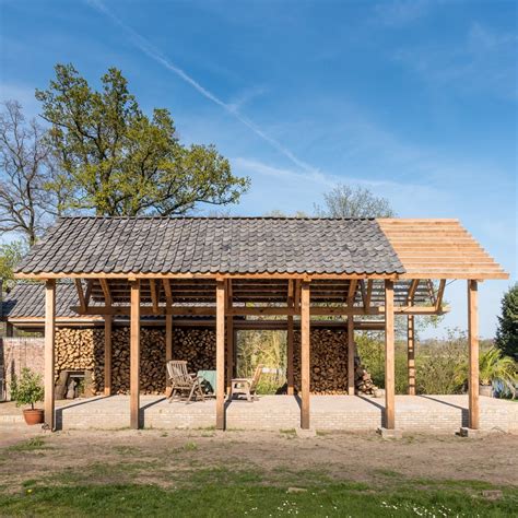 DeBossa Installs Split Level Timber Pavilion In The Grounds Of A Dutch