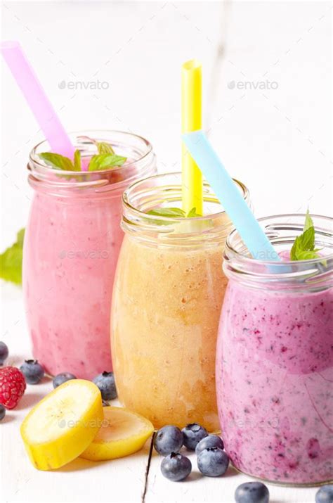 Assorted fruit shakes on white table in 2024 | Fruit shakes, Shakes, Fruit