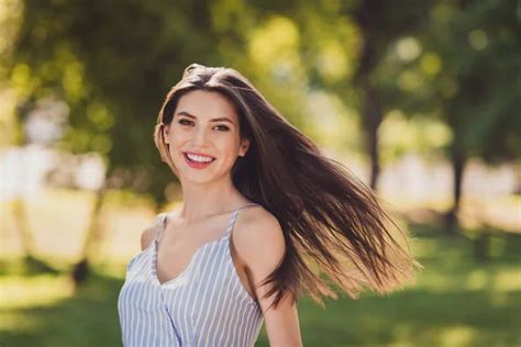 Portrait Of Cheerful Good Mood Adorable Sweet Lady With Flying Long