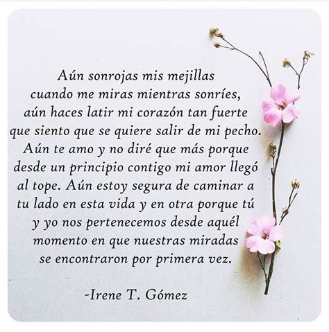 A Poem Written In Spanish With Pink Flowers On The Bottom Left Corner