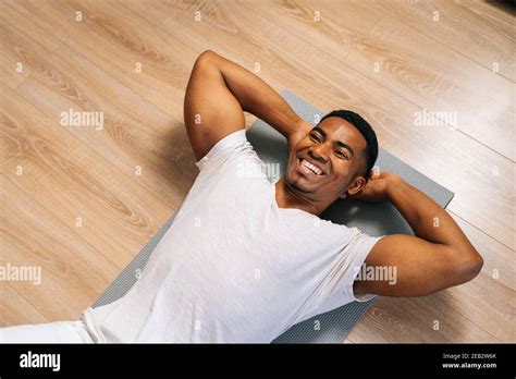 Top View Of Fit African American Man Practicing Abs Crunches Training