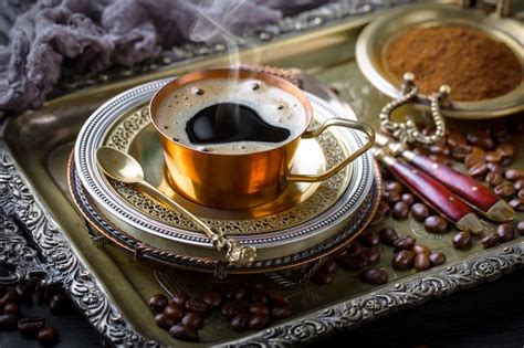 Premium Photo | Coffee in a cup and saucer on an old.