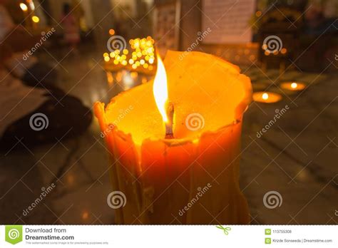 Candles In The Dark Blur Background Close Up Light Candle Flame Yellow