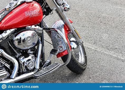 Beautiful Red And Chrome Harley Davidson Motorcycle Parked On A Road