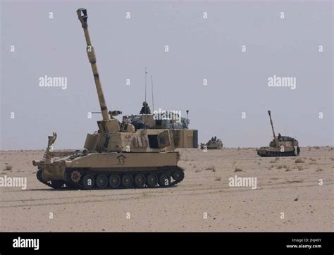 SOUTHERN IRAQ - U.S. Army vehicles are seen deployed in the desert of ...