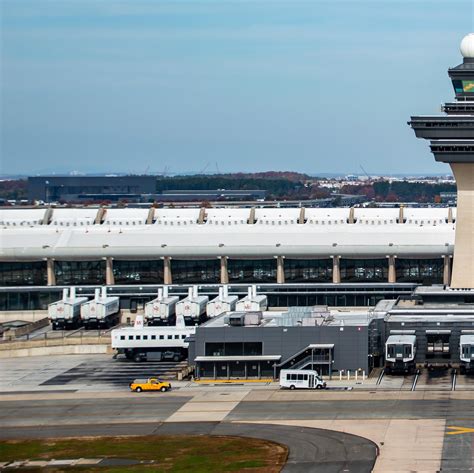 The Dulles Airport Main Terminal and old tower. Taken from the MWAA