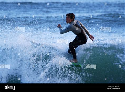 Surfer surfing in Estoril Cascais Portugal Stock Photo - Alamy