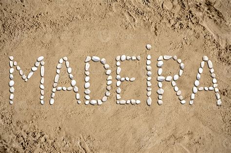 Como Se Escreve Madeira - Madeira - Word Made with Stones on Sand 21923508 Stock Photo at Vecteezy