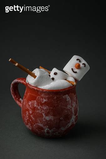 Marshmallow Snowman Taking Hot Tub In A Red Ceramic Cup Full Of Cocoa With Milk Foam Christmas