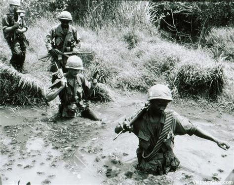 A Squad Of The 60th Infantry 9th Infantry Division Cross A Stream