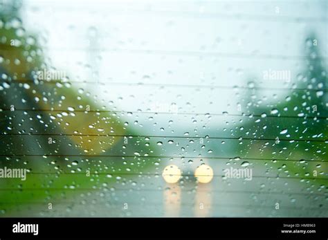 Driving in the rain Stock Photo - Alamy