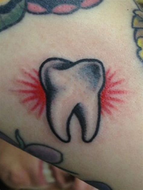 Traditional Tooth Tattoo