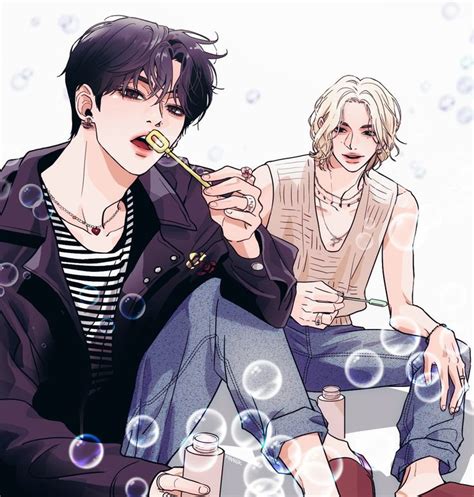 Two People Sitting On The Ground With Bubbles In Front Of Them And One Person Brushing His Teeth