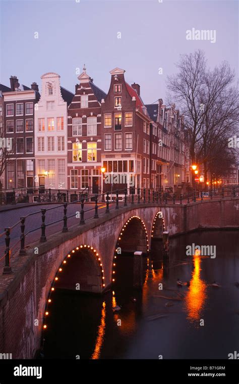 Canal and bridge at night, Amsterdam, Netherlands Stock Photo - Alamy